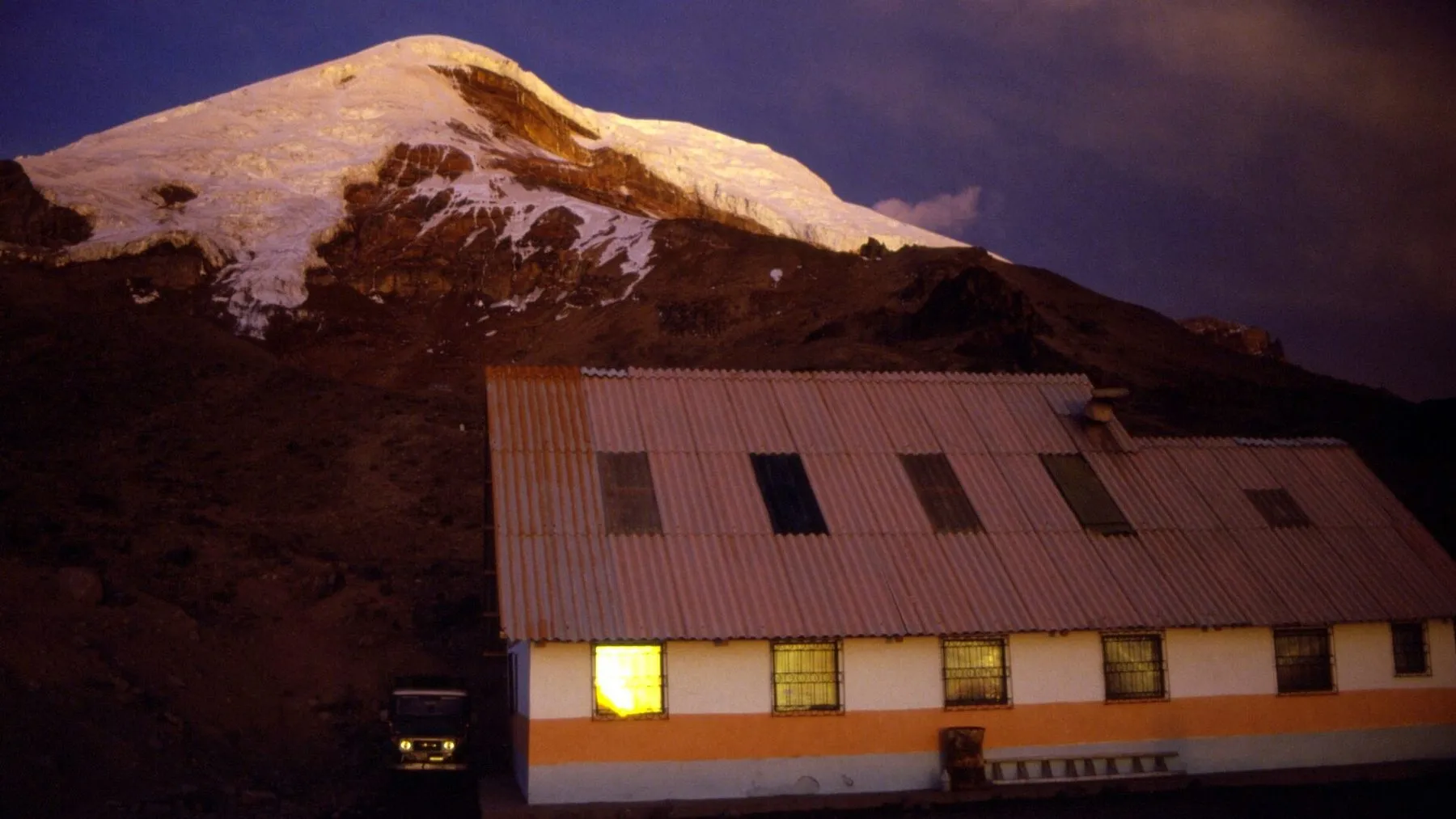 The Carrel refuge on Chimborazo, with the summit behind it